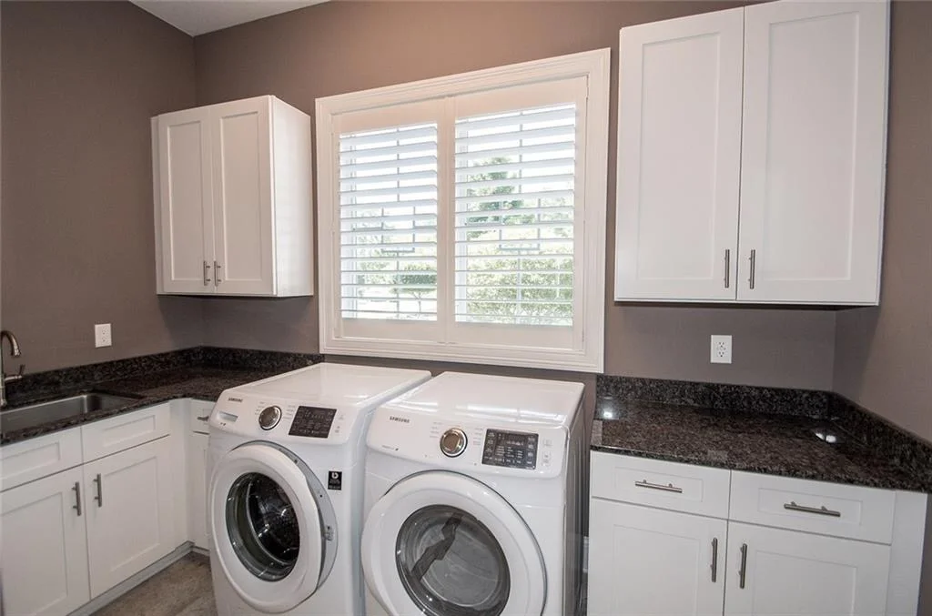 Holiday home — laundry room before