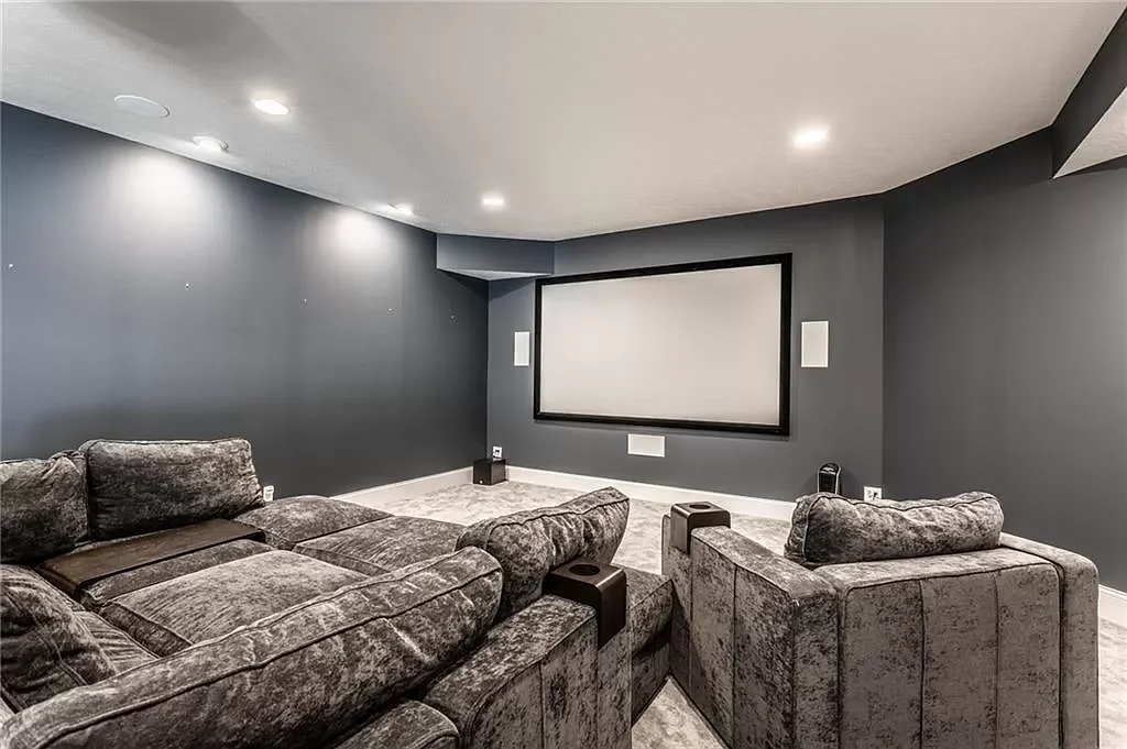 Finished basement living room with couch and TV in Brownsburg home